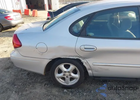2003 Ford Taurus Se z USA, uszkodzony, nr VIN 1FAFP53U33A138623